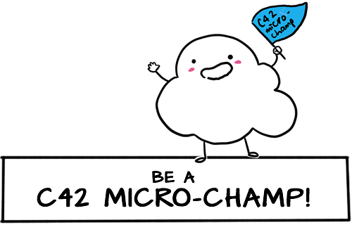 A smiling white cloud holding a blue flag with the words 'C42 Micro-champ'. The cloud stands atop a white rectangle with the words 'BE A C42 MICRO-CHAMP!' in black font.