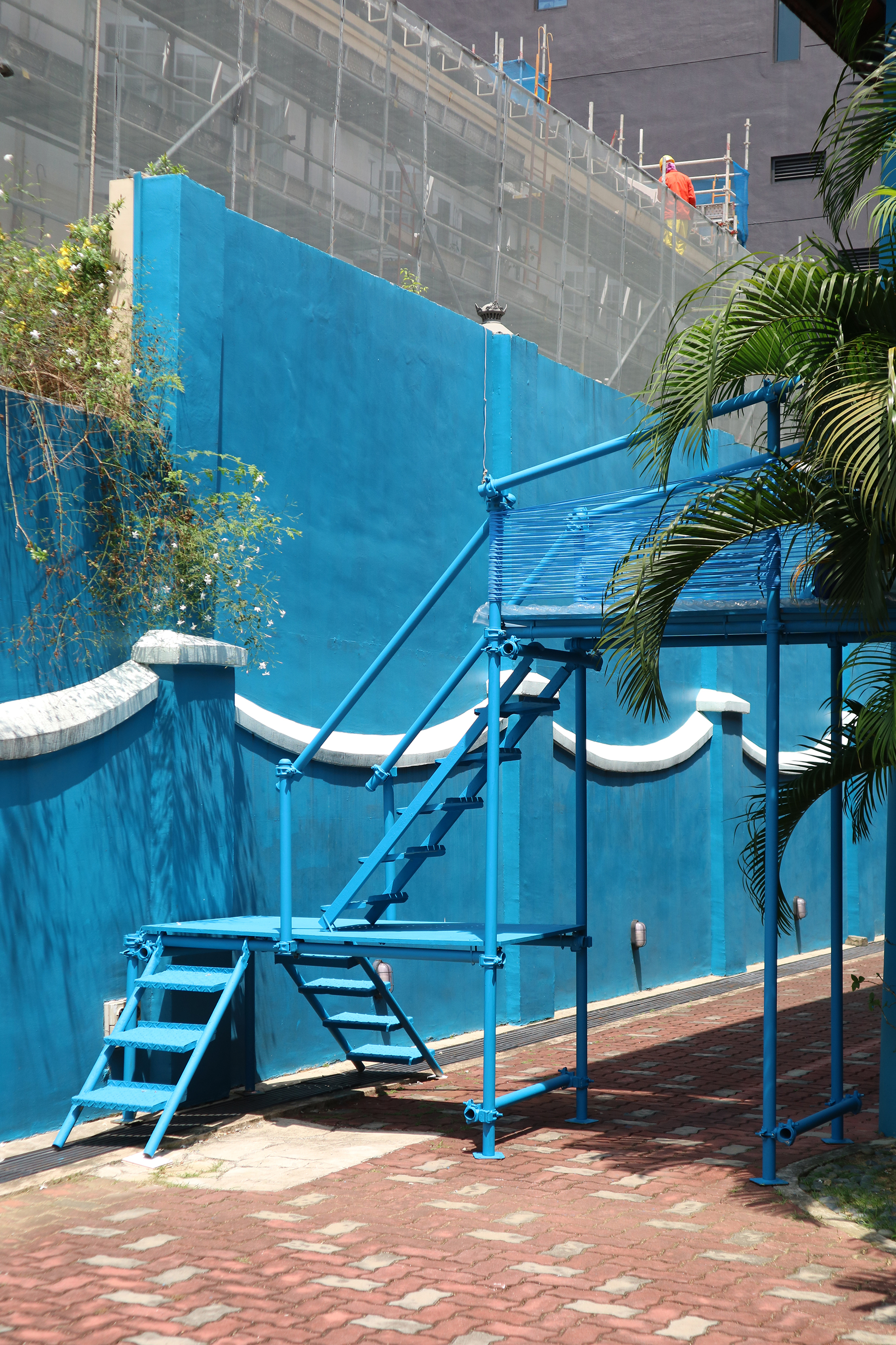 An outdoor staircase structure leading up to the second floor of the Centre 42 building.