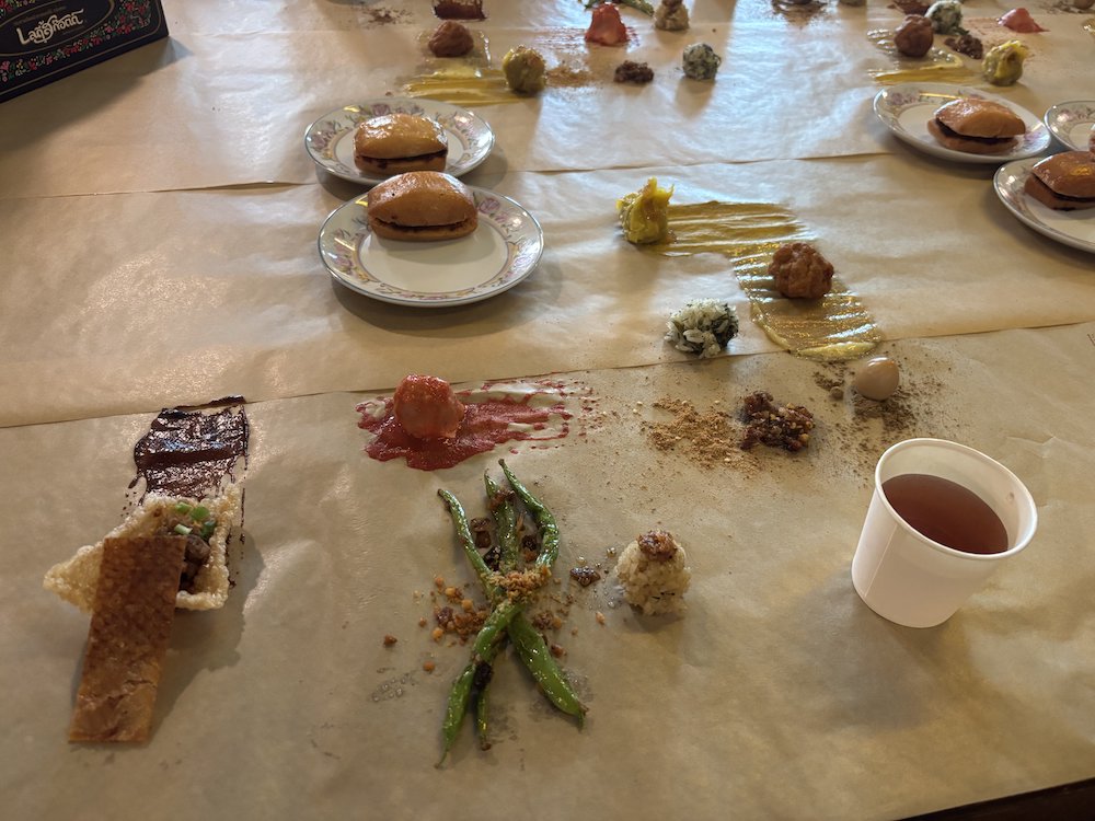 Assorted small tasting dishes on brown paper. Assorted small tasting dishes on brown paper.