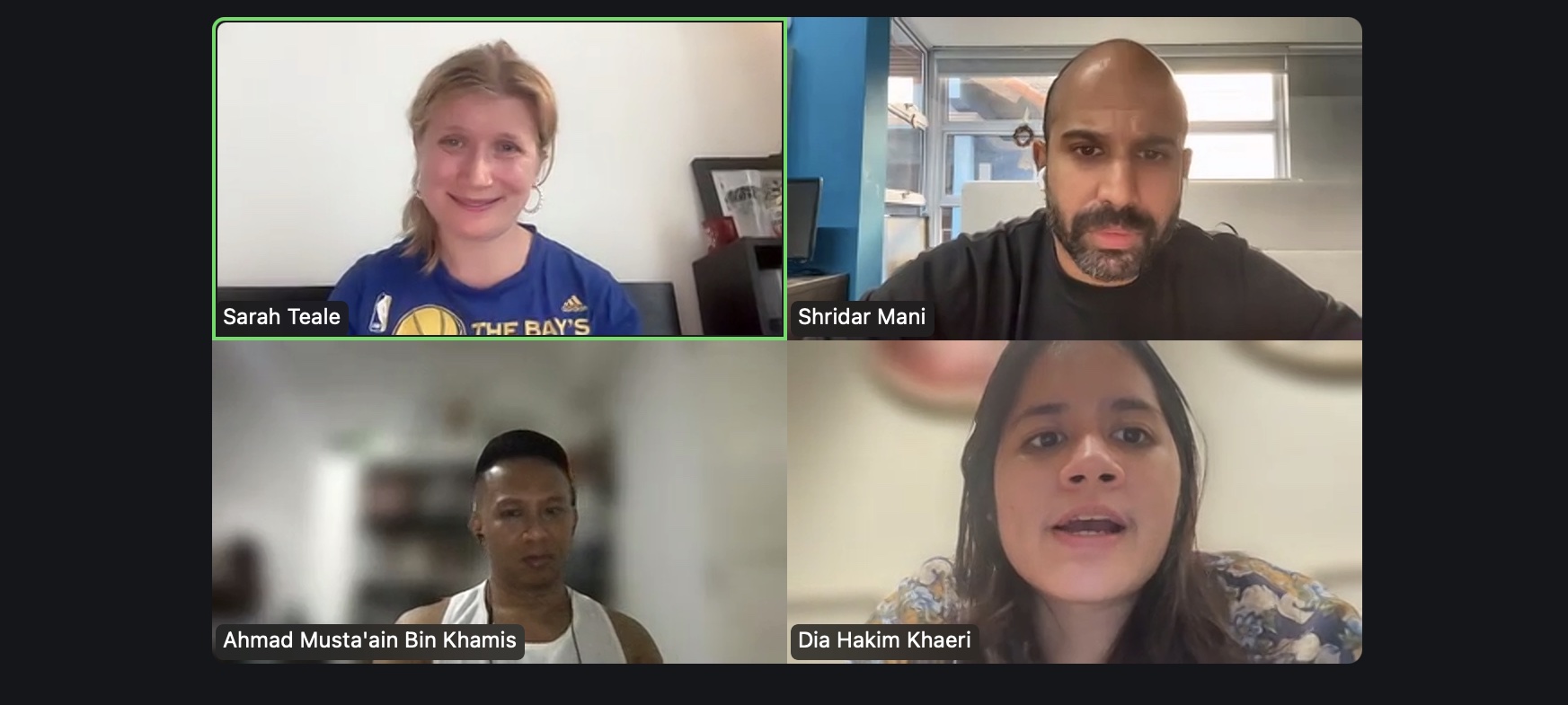 A screenshot of a Zoom recording featuring four persons.