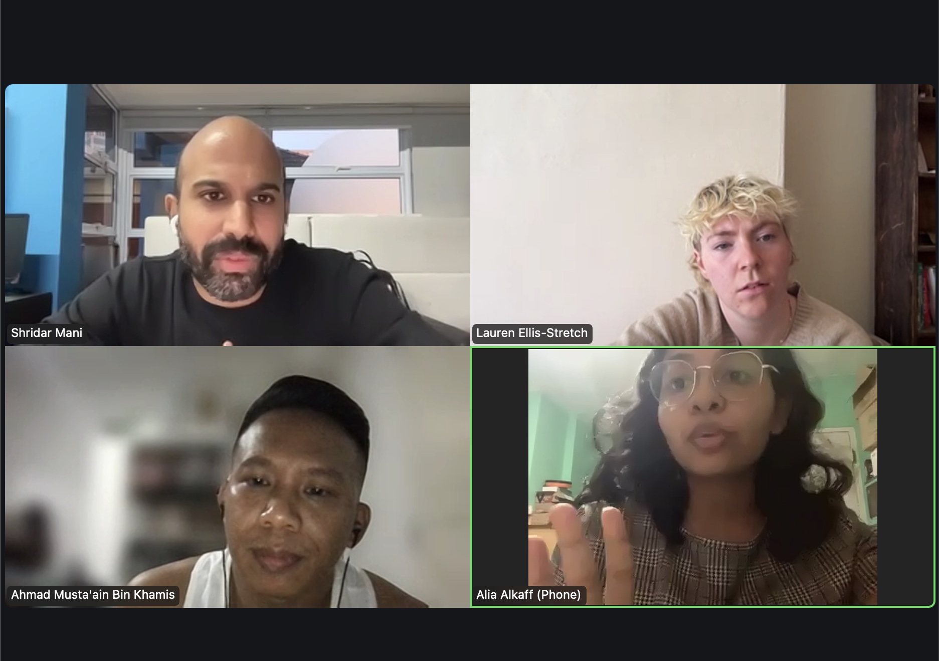 A screenshot of a Zoom recording featuring four persons.