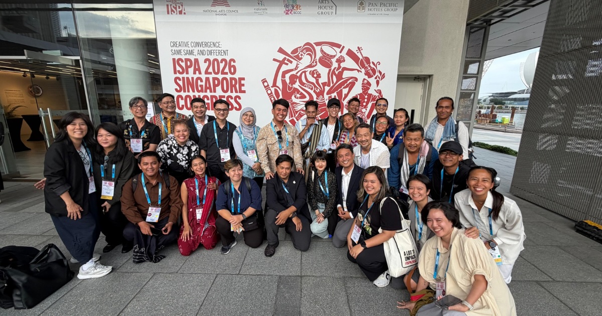 A large group of people smiling and posing in front of a 'ISPA 2026 Singapore Congress' banner.