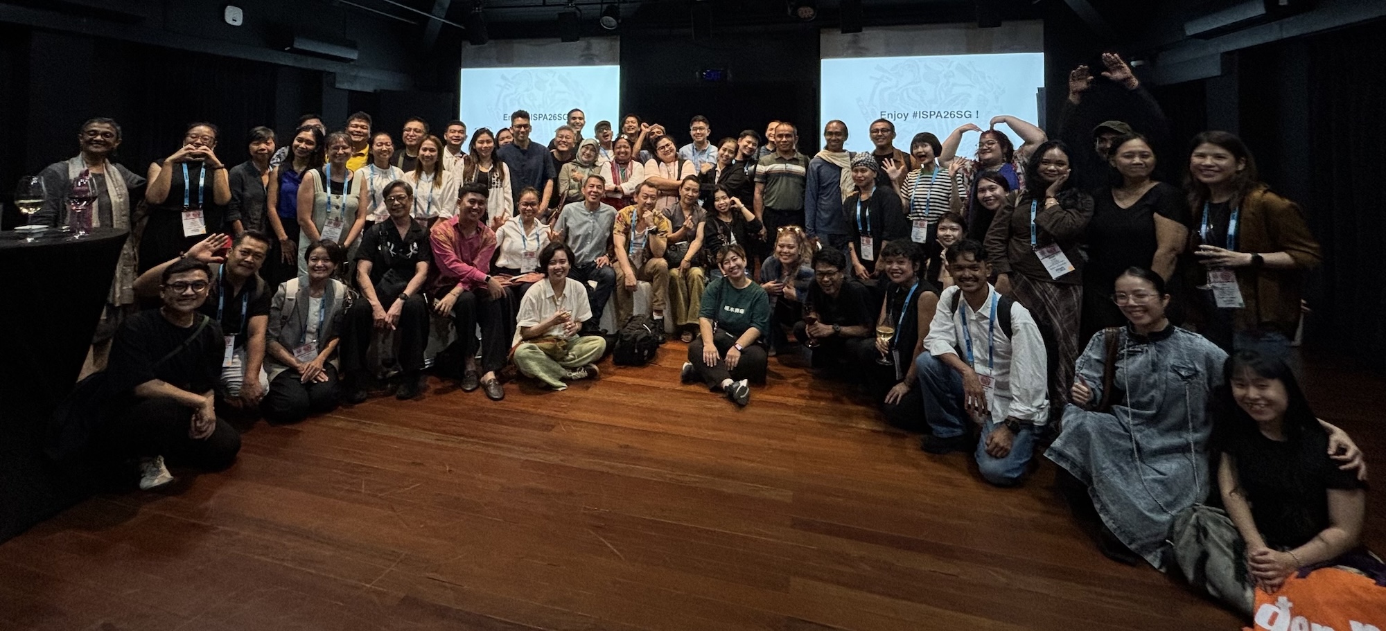 A very large group of people posing together for a group photo.