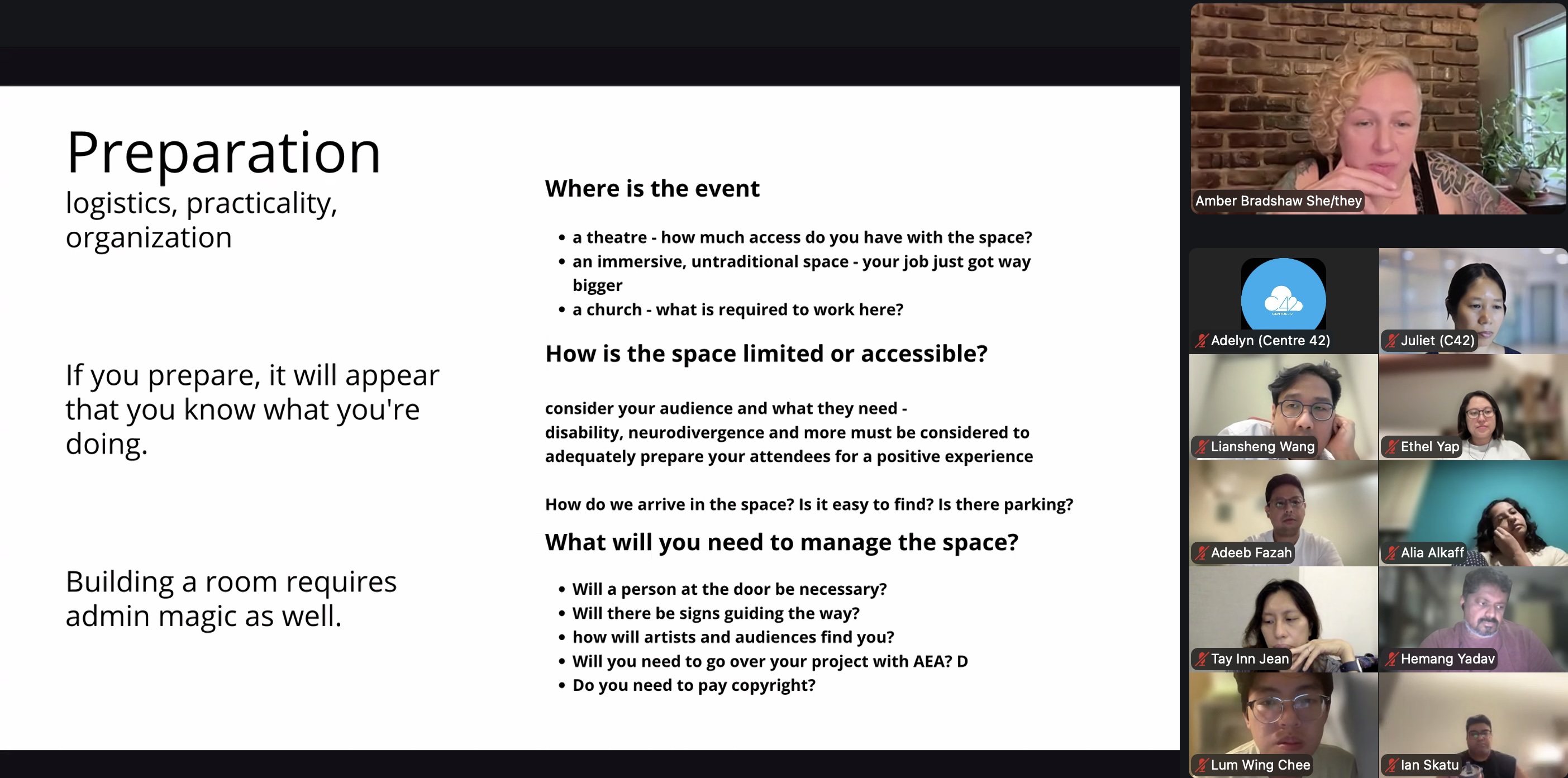 A Zoom session with a screen-share alongside a gallery of participants.