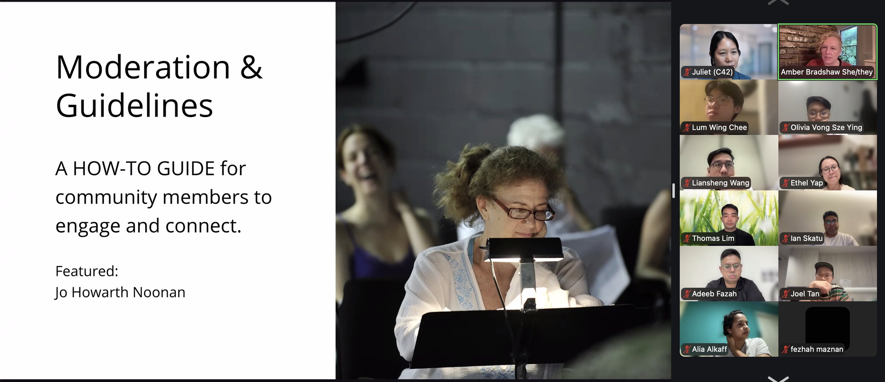 A Zoom session with a screen-share alongside a gallery of participants.